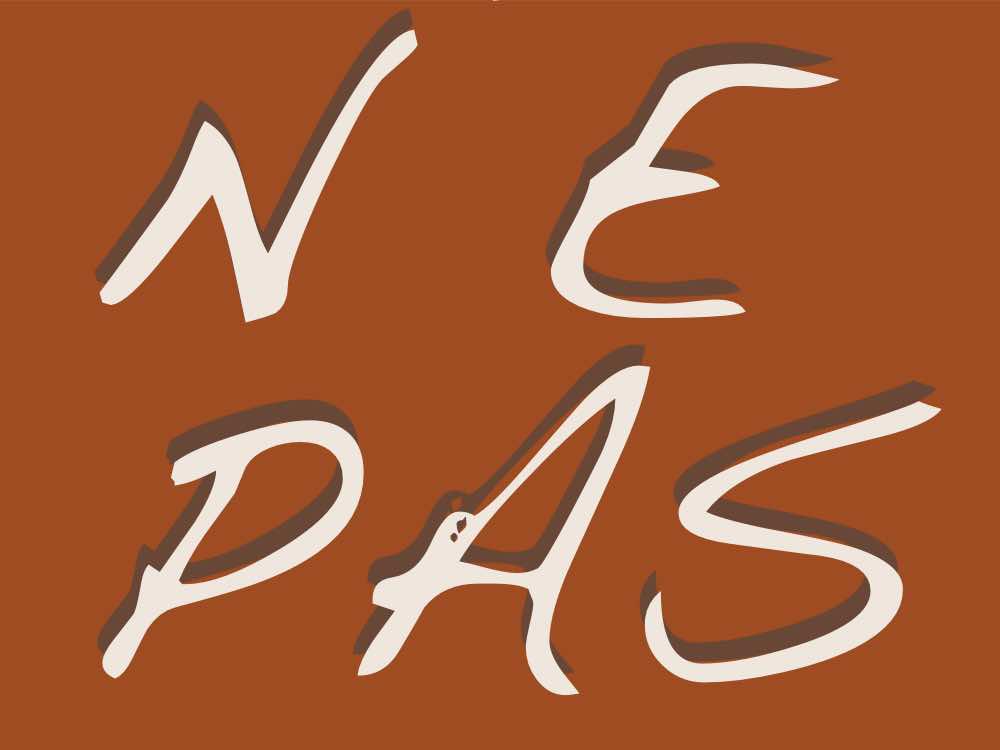 En el fondo rojo se lee: Ne pas